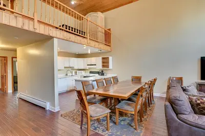 a kitchen and dining room with a wooden table and chairs at Less Than 1 Mi to Hunter Mtn Skiing Family-Friendly Stay! in Lanesville