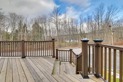a wooden deck with wooden railings and a fence at Less Than 1 Mi to Hunter Mtn Skiing Family-Friendly Stay! in Lanesville