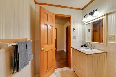 a bathroom with a sink and a mirror at Less Than 1 Mi to Hunter Mtn Skiing Family-Friendly Stay! in Lanesville