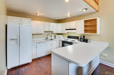 a kitchen with white cabinets and a white refrigerator at Less Than 1 Mi to Hunter Mtn Skiing Family-Friendly Stay! in Lanesville