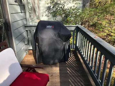 a backpack sitting on the porch of a house at Lakeridge Litchfield townhouse pool tennis skiing in Torrington