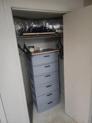 a closet with a bunch of drawers and a shelf at Bridgeport East Main in Bridgeport