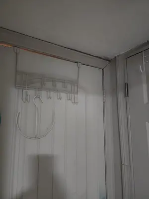 a shower curtain in a room with a window at Bridgeport East Main in Bridgeport