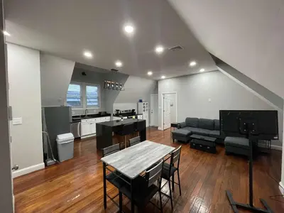 a living room with a couch and a table at Apartment in Middletown-Wesleyan 301 in Middletown