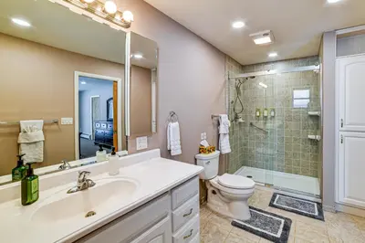 a bathroom with a sink and a toilet and a shower at Catskills Group Getaway on 50 Scenic Acres! in South Kortright