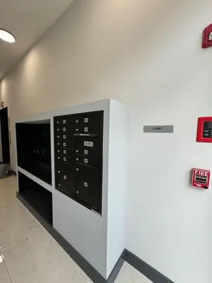 a wall with a microwave oven in a room at Free Indoor Parking 25 Minutes to NYC in West New York