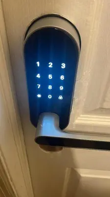 a blue light on the ceiling of a room at Luxury Apartment near Airport in Newark