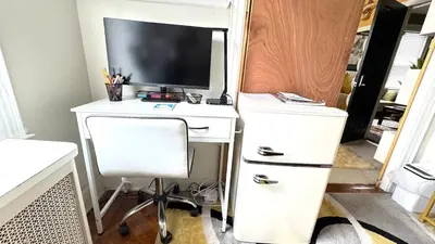 a white desk with a computer and a tv on it at Sunshine Dream - Deluxe Double Room in Private House - NYC in Sunnyside