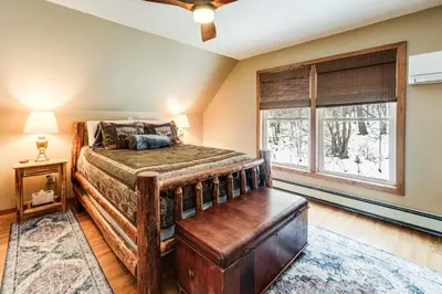 a bedroom with a bed and a window at Mount Vision Home for Cooperstown Baseball Fams in Mount Vision