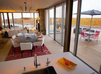 a kitchen and dining room with a table and chairs at Extraordinary Private Retreat Near NYC in Highland