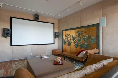 a living room with a couch and a blank screen at Extraordinary Private Retreat Near NYC in Highland