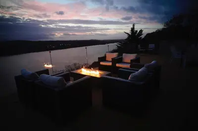 a group of couches and a coffee table with a sunset at Extraordinary Private Retreat Near NYC in Highland