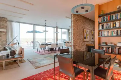 a living room with a table and a dining room at Extraordinary Private Retreat Near NYC in Highland