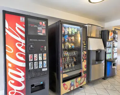 two soda machines are next to each other at Red Roof Inn Hartford - Vernon in Vernon