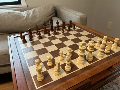 a chess board with chess pieces on a wooden table at Private Mountain Retreat On 10 Acres The Perfect Family Escape in Cheshire