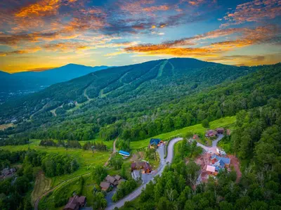 an aerial view of a village in the mountains at Windham Slopes - Ski-In-Out, Hot Tub & Fire Pit in Windham