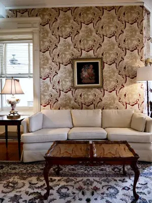 a living room with a couch and a table at Turkey Hill Inn in Summit