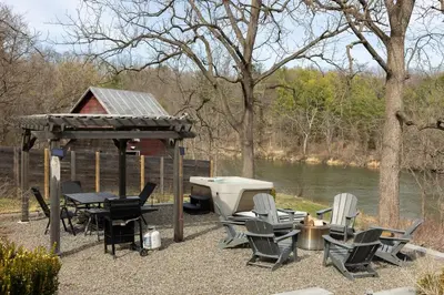a gazebo with chairs and a table and a grill at Rustic Luxe Creekside Retreat with Hot Tub and Fire Pit, Minutes From Hudson in Hudson