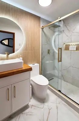 a bathroom with a toilet and a glass shower at Blackwood Cabin Pocono in Pocono Farms East