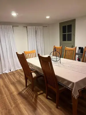 a dining room table with chairs and a table and a table and a table at Cozy Stay Near Jiminy Peak & Bousquet Mountain in New Lebanon
