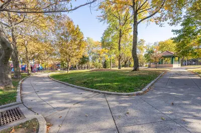 a walkway in a park with trees at 2 Beds Sleeps 4 Near NYC and MetLife FIFA 2026 in Jersey City