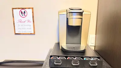 a coffee maker sitting on top of a counter at 2-Joint Large Deluxe Rooms in Private House - NYC in Sunnyside