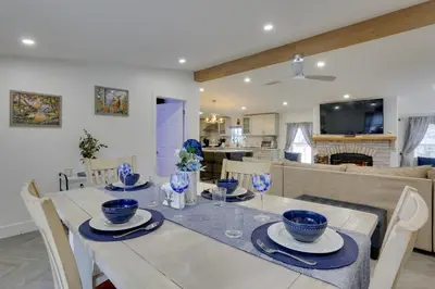 a dining room and living room with a table and chairs at Hike and Explore! Nature-Centric Hudson Valley Home in Napanoch
