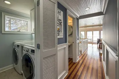 a laundry room with a washer and dryer at Pine Creek Beach House in Fairfield