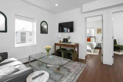 a living room with a couch and a table at Harbor Haven, Apt #2, 2 BR/1BA in Stamford