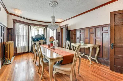 a dining room with a table and chairs at Dedicated Workspace! Home 2 Mi to Dtwn Schenectady in Schenectady