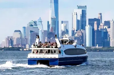 a boat in the water with a group of people on it at 3 Bedroom Apt in LIC, 2 Stops to Manhattan! in Roosevelt Island