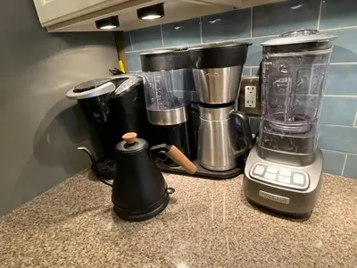 a blender sitting on top of a kitchen counter at Downtown 3BR duplex full kitchen parking off i-787 in Albany