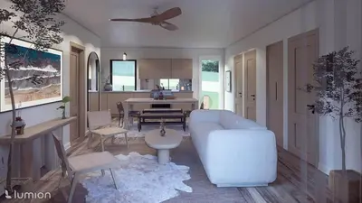a living room with a white couch and a kitchen at The Goldenrod - Catskills Mountain Retreat