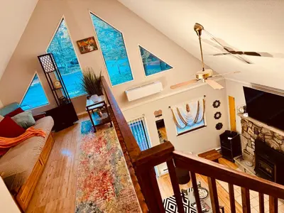 an overhead view of a living room with windows at Cozy Cabin in Tobyhanna