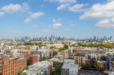 a view of a city skyline with tall buildings at Blueground Southside rooftop nr McCarren Park NYC-2012 in Brooklyn