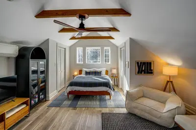 a bedroom with a bed and a ceiling fan at Lakefront Escape with Dock! Hudson Valley Home in Hillsdale