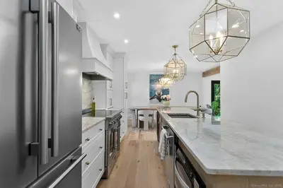 a kitchen with a sink and a counter top at Renovated Retreat with Heated Pool in Redding