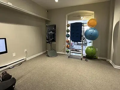 a room with a gym with a mirror at Landing Stylish 1BD Gym in New Haven