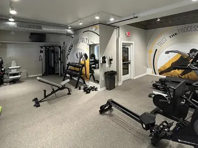 a gym with several exercise equipment in a room at Landing Stylish 1BD Gym in New Haven