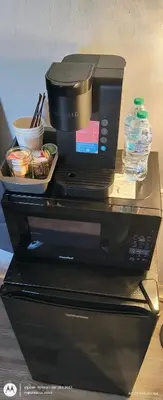 a printer sitting on top of a desk at Windmill Motel Restaurant in Bernardston