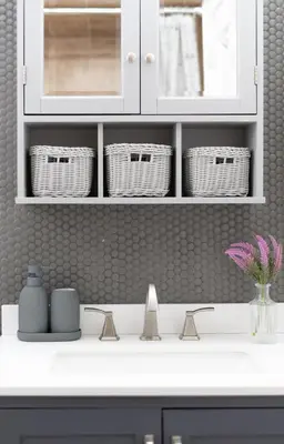 a kitchen counter with white cabinets and baskets at New home, 17 min to NYC, 5 min to MetLife Stadium in Carlstadt