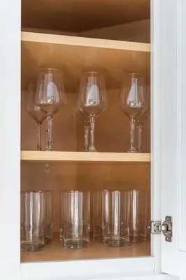 a bunch of wine glasses sitting on a shelf at New home, 17 min to NYC, 5 min to MetLife Stadium in Carlstadt