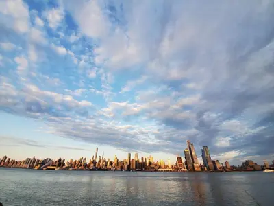 a view of a large city from the water at Duplex 15 mins from Time Square! in West New York