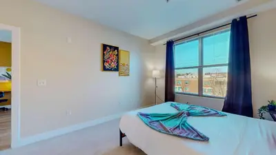 a bedroom with a bed and a window at Great Charming stay in Stamford