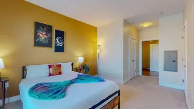 a bedroom with a large white bed in a room at Great Charming stay in Stamford