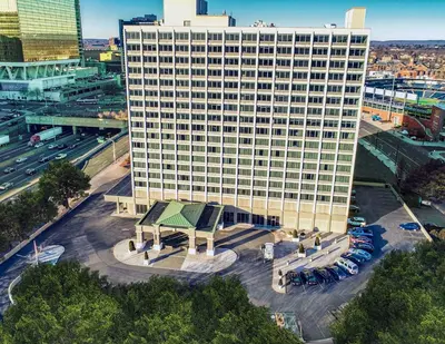 an overhead view of a large building in a city at Landing Chic 1BD Pool Game Room in Hartford