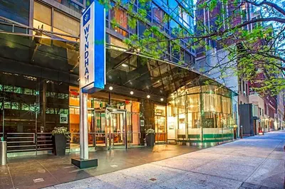 a building with a sign in front of it at Club Wyndham Midtown 45 in New York