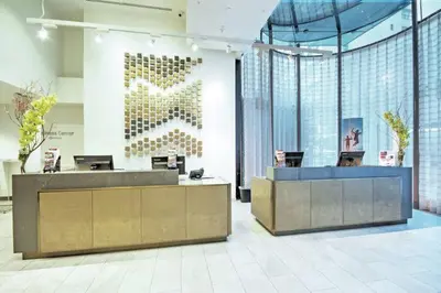 a lobby with a reception desk in a building at Club Wyndham Midtown 45 in New York
