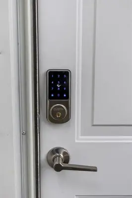 a door with a door knob on a white door at New England Nest - Modern 2BR Home with EV Charger in Shelton