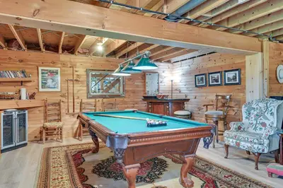 a pool table in a room with wooden walls at Beautiful and Unique Farmhouse 15 Mi to Saratoga in Argyle